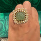 Carved emerald ring