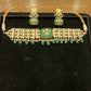 Carved gold motif on green stone choker