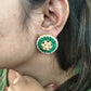 Green circular polki earrings