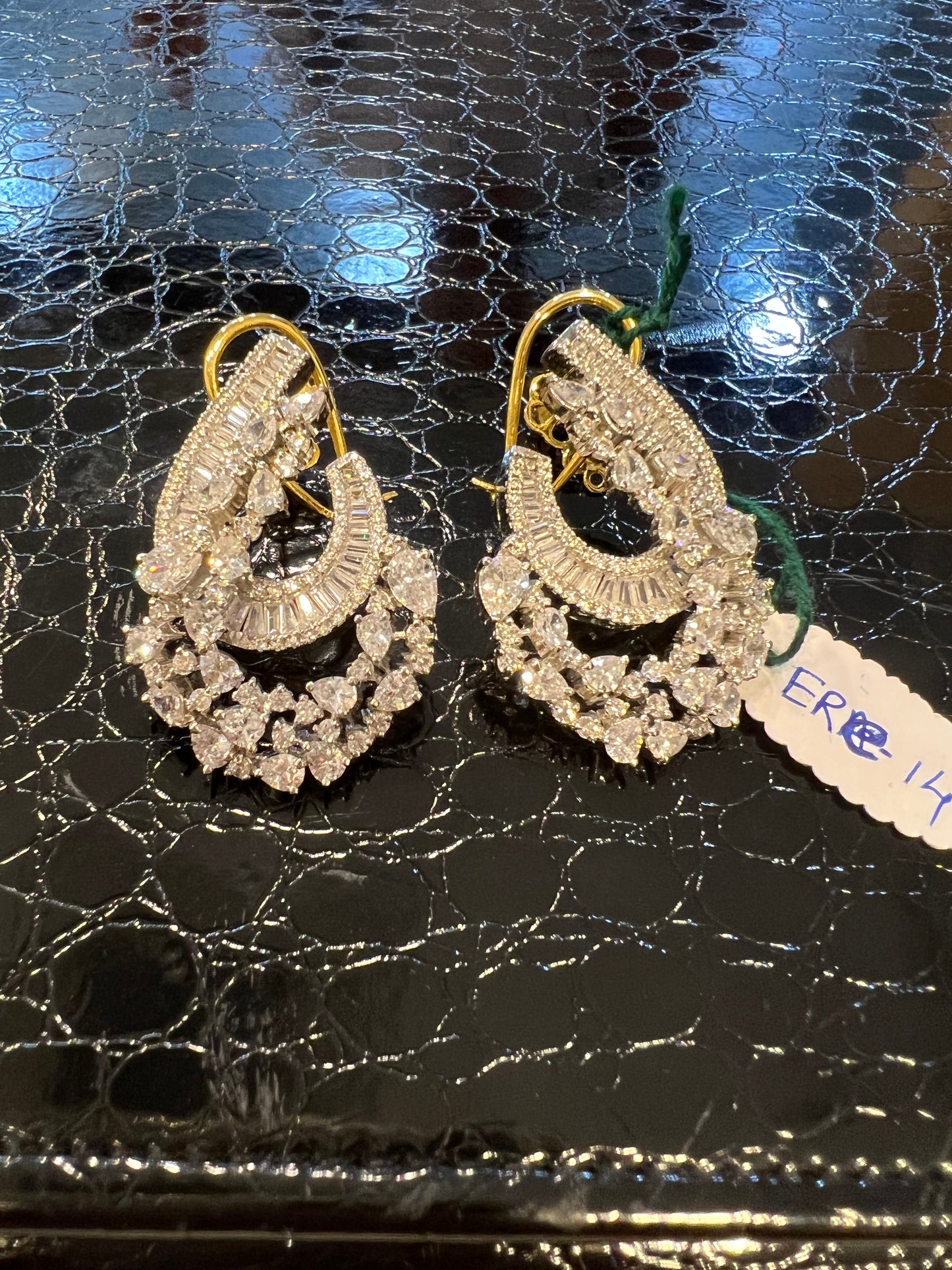 Half drop shaped Swarovski earrings